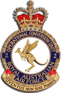Crest of 2 Operational Conversion Unit, Royal Australian Air Force, featuring a winged kangaroo and the motto "Juventus Non Sine Pinnis"