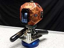 A smartphone-equipped SPHERES satellite.
