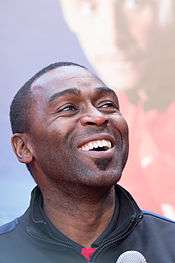 Andy Cole, who is seen smiling, started his professional career at Arsenal, before later finding success at Newcastle and Manchester United.