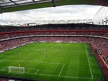 A near-capacity crowd watch Arsenal play Real Madrid on the second and final day of the pre-season tournament.