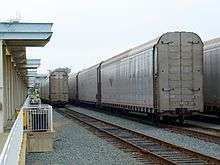 Autoracks lined up at their loading ramps at the Lorton station.