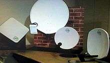 A photo of all three BSB dishes available, the squarial, a Sky dish for comparison, the round BSB dish, and the square BSB dish.