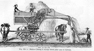A picture of a 19th-century threshing machine