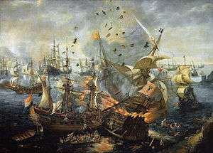 Painting of a fleet of ships showing one ship exploding in flames, with men and debris flying in the air and other men in the water, jumping overboard or taking to lifeboats