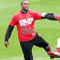 South African striker Benni McCarthy, warming up for a charity match