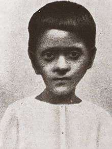 A young Bengali boy looking forward