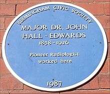 "A plaque with the inscription 'Birmingham Civic Society, Major Dr. John Hall-Edwards, 1858-1926, Pioneer Radiologist worked here, 1987'"