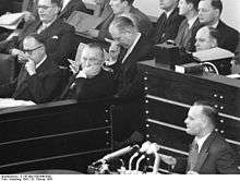 Walter Hallstein sitting with Konrad Adenauer in the Bundestag; Karl Mommer speaking