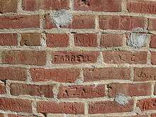 Photo of bricks carved with names