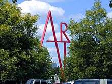 CCAD's 100 foot tall red steel campus sculpture of the letters A R and T