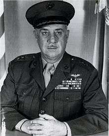 A black and white image of Charles Hayes, a white male in his Marine Corps dress uniform