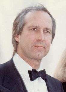 Photo of Chevy Chase attending the 62 Academy Awards in 1990.