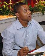 Photo of Cuba Gooding Jr. signing autographs in 2006.