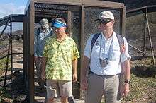 USFWS Director Dan Ashe entering Kaena Point State Park through a gate in the predator proof fence