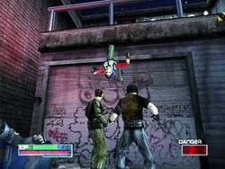 Gameplay shot of Max mid-backflip after kicking off a wall, above two male opponents