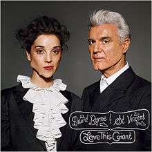 The cover of Love This Giant: The musicians facing the camera and wearing black formal attire with jagged deformities on their faces