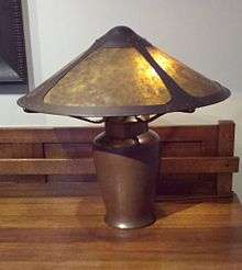Photo of a copper lamp designed by Dirk Van Erp
