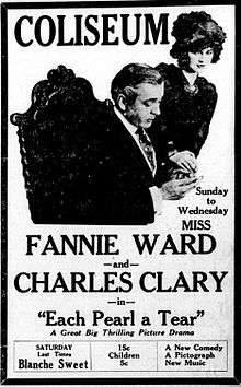A simple newspaper advertisement with a photo of a man and a woman on the top.