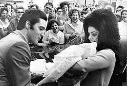 Elvis Presley and Priscilla with newborn Lisa Marie