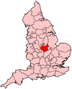 A small county slightly, located in the centre of a country. It is completely bounded by other counties.
