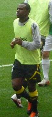 A colour photograph of Fabrice Muamba, in training before a league match.