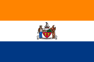 A flag of three horizontal colors is shown: orange on top, then white, and blue. At center is the coat of arms shown in the infobox image.
