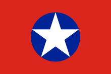 A rectangular flag design with a red background and blue circle in the middle. A five-point white star is located inside the circle with its points touching the circle edge.
