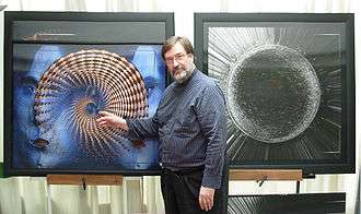 artist with his works.