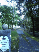 Front View of Mappa Hall and Grounds with Sign