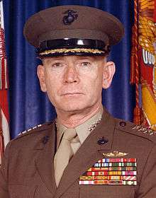 A color image of Paul Kelley, a white male in his Marine Corps dress uniform