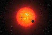 The newly discovered super-Earth surrounding the nearby star GJ 1214.