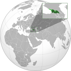 Georgia proper shown in dark green; areas outside of Georgian control shown in pattern.