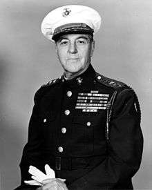 A black and white image of Gerald Thomas, a white male in his Marine Corps dress uniform