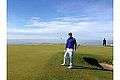 Golfer on the 16th green at Bandon Dunes.jpg