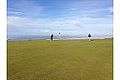 Golfers on the 16th green at Bandon Dunes.jpg