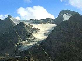 View of the Grande Aiguille Rousse (right) and the Italian glaciers of Carro from the east.