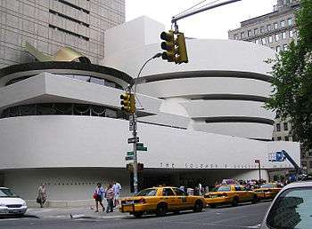 The Guggenheim museum with taxis in the foreground