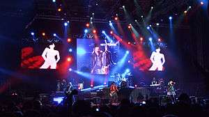 Guns N' Roses performing.