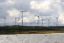 Rõuste wind turbines next to wetland
