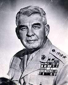 A black and white image of Harry Schmidt, a white male in his Marine Corps dress uniform