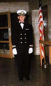 A color photograph of Milk in his Dinner Dress Blue Navy uniform