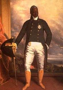 painting of a black man in noble clothing, holding a cane