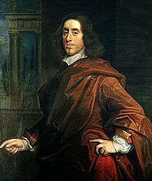 A painting of a man with a virile face and long dark hair; he is wearing a dark red robe-like outfit, and his demeanour conveys elegance and importance.