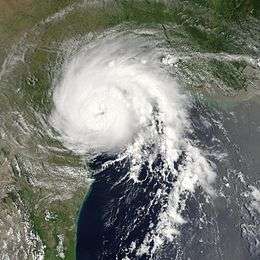 View of the storm from Space on July 13, 2003. The roughly circular storm is about to make landfall in Texas. Mexico and Louisiana are seen to the south and north, respectively.