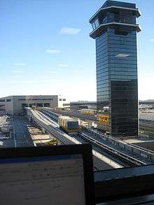 Narita International Airport control tower and people mover