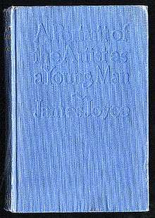 A book cover.  It is entirely blue, and has "A Portrait of the Artist as a Young Man ~ James Joyce" embossed on it.