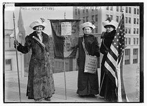  Rosalie Jones, with fellow suffragettes Jessie Stubbs and Ida Craft, handing out WSP meeting fliers, circa 1912-1913
