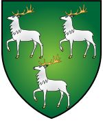  A shield displaying a coat of arms. A green background with three white stags (two above one) facing left, with their front right feet raised