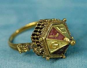 gold Jewish wedding ring with Hebrew letters.