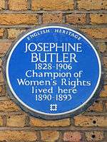 Circular blue plaque with the words "Josephine Butler / 1826–1906 / Champion of / Women's Rights / lived here / 1890–1893"